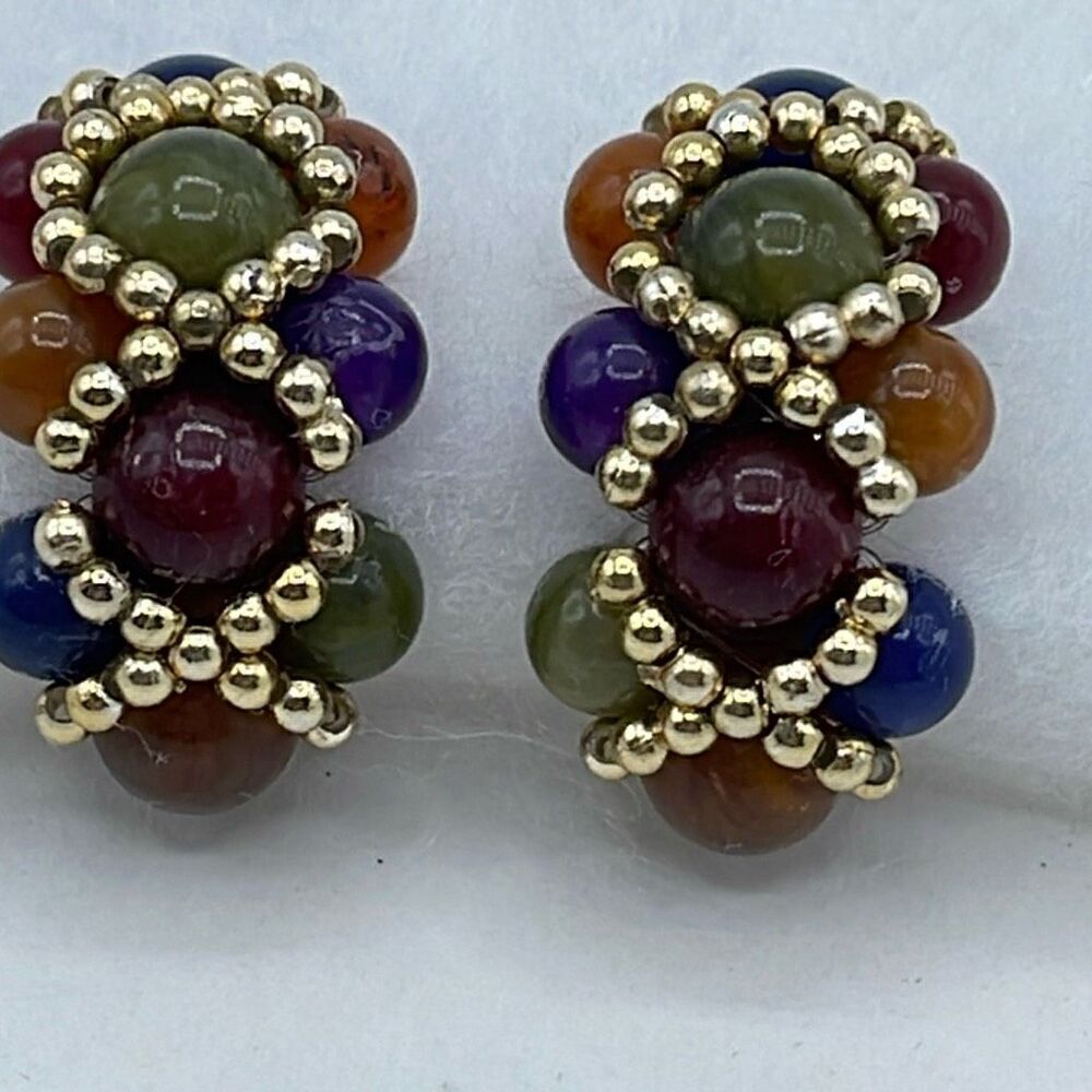 Vintage 80’s-90’s big bold acrylic beaded clip earrings.